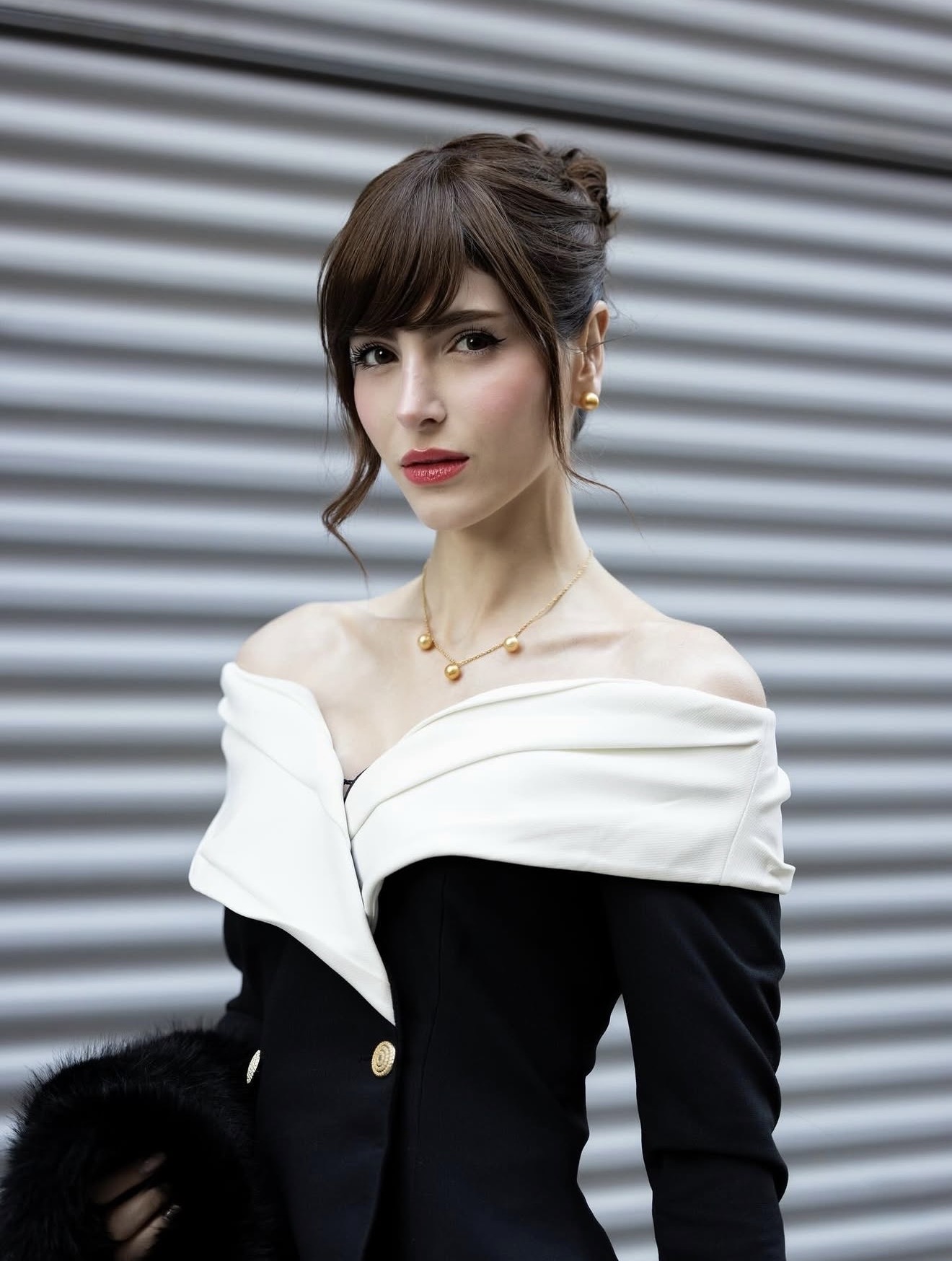 Front view of Stephany Abasali's elegant updo styled by Mirna Franco